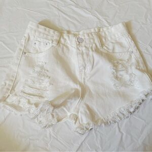 White denim distressed shorts